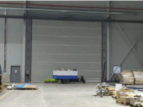 kupować Drzwi pionowe o dużej wytrzymałości z PVC o grubości 1,2 mm, z prędkością otwierania do 1,2 metra na sekundę, zaprojektowane do zastosowań przemysłowych i o dużej wytrzymałości online manufacture
