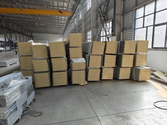 Drzwi garażowe sekcjonalne z urządzeniami przeciwrozbicia sprężyny i urządzeniami przeciwrozbicia liny