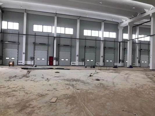 Zindywidualizowany rozmiar Pionowe drzwi sekcjonalne Izolowane drzwi sekcjonalne nad głową ISO 9001